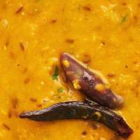 Tadka Dal · yellow lentils, herbs and cilantro garnish