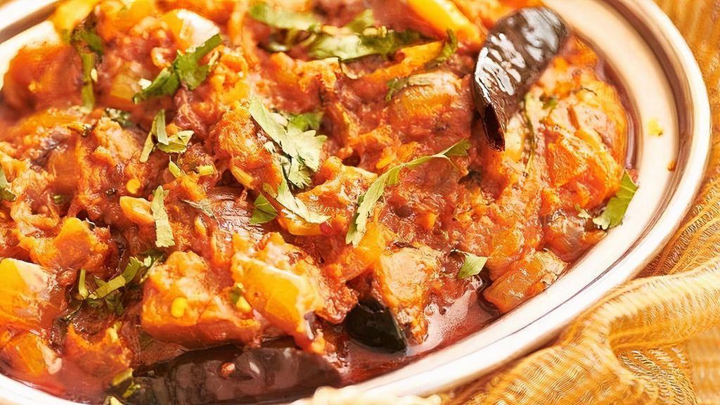 Baingan Bharta · roasted eggplant cooked with tomatoes and mixed spices