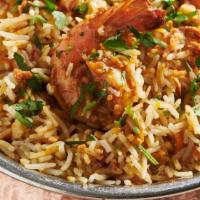 Shrimp Biryani · slow cooked basmati rice prepared with herbs and saffron