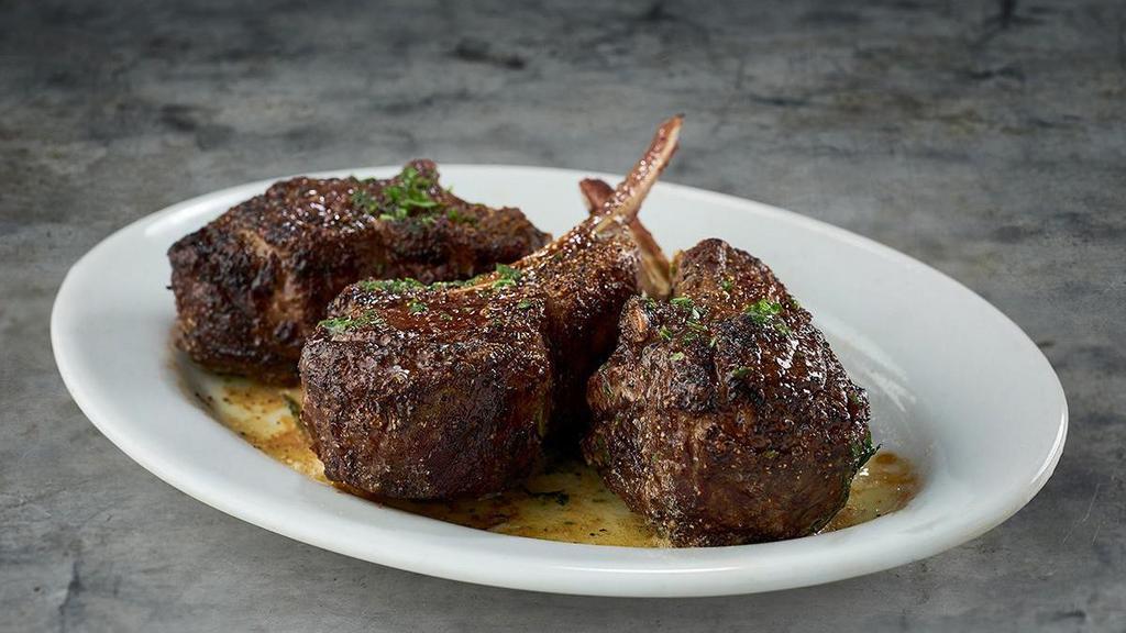 Lamb Chops* · three extra thick marinated chops, with fresh mint