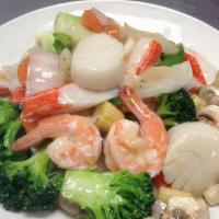 Seafood Delight · Jumbo shrimp, sea scallop, lobster, crabmeat, and squid cooked with lucky assorted vegetable...