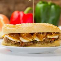 Philly Cheesesteak Hero · Fresh steak, American cheese, peppers, and onions, served in a soft hero roll.