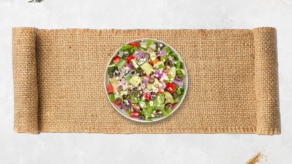 Greek God Salad · Romaine lettuce, cucumbers, tomatoes, red onions, olives, and feta cheese tossed with balsamic vinaigrette dressing.