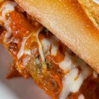 The Omg! · Chicken parmigiana with  vodka sauce served on top of garlic bread  with our special secret ...