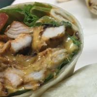 Wise Guy · Grilled chicken, lettuce, tomatoes, melted American cheese and spicy ranch sauce in a wrap.