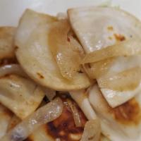 Grilled Pierogies
 · Potato cheese pierogies with grilled onions and a side of sour cream.