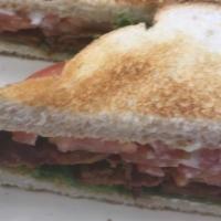 Blt · Classic bacon, lettuce and tomatoes on toasted white bread with mayo.