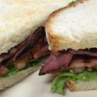 Blt With Turkey-Bacon · Turkey-bacon, lettuce and tomatoes on a toasted white bread with mayo.