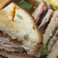 Pick Your Club · Choice of turkey breast, roast beef, or ham stacked with crisp bacon, lettuce, tomatoes, and...