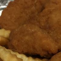 Chicken Tenders And Fries · Golden Chicken Tenders sided by French Fries
