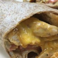 Marinated Chicken Tortilla · Grilled chicken, mustard, tomatoes and American cheese in a wrap.