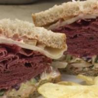 Carnegie Sandwich · Hot corned beef on rye with Russian dressing, coleslaw and melted swiss.