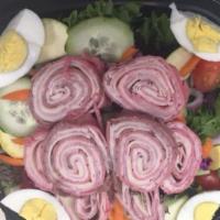 Jumbo Chef Salad · Huge garden salad topped with roast beef, turkey, ham, Swiss cheese and an egg.