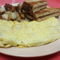 Western Omelette Platter · Ham, onions, peppers and cheese. Served with home fries and buttered toast.