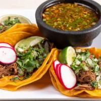 Tacos Con Consome (3 Pieces) · Our Tacos are served on fresh soft corn tortilla, finished with freshly cut white onions and...