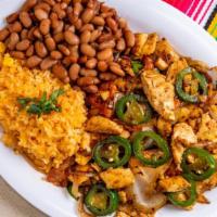 Pollo A La Mexicana · Served with rice and beans. Grilled chicken with, tomatoes and jalapenos peppers.