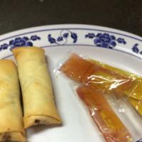 Spring Roll · Two rolls. Rice paper or crispy dough filled with shredded vegetables.