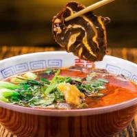 Special Beef Noodle Soup 红油卤牛肉面 · Hot & spicy.
