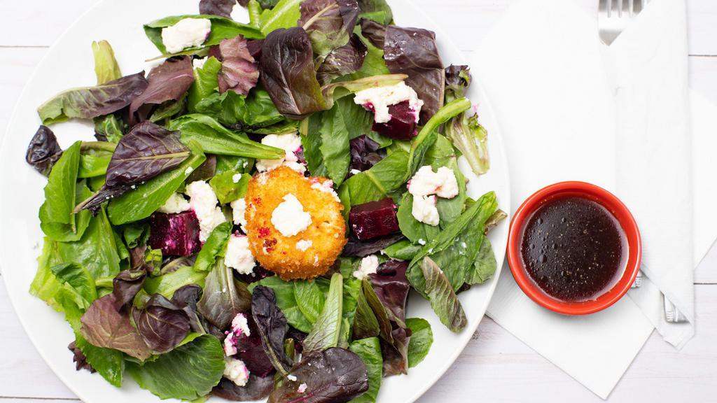 Beets & Goat Cheese · Mixed greens, red beets, fried goat cheese medallion, crumbled honey goat cheese, sesame dressing.