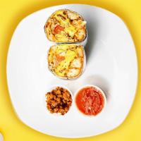 Great Greek Breakfast Burrito · Spinach, olives, feta cheese, eggs, tater tots, tomatoes and caramelized onions wrapped in a...