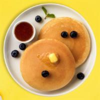 No Blues With Blueberry Pancakes · Fluffy pancakes cooked with care and love served with blueberries, butter and maple syrup. S...