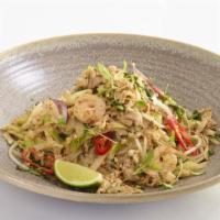 Chicken Pad Thai · Contains peanut. Rice noodles in a tamarind sauce with chicken egg, beansprouts, leeks, chil...