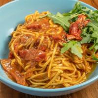Spaghetti · Pomodoro, house-stewed San Marzano tomato sauce, basil, EVOO.