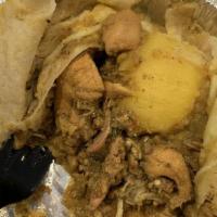 Chicken Roti · Served with potato and chana.