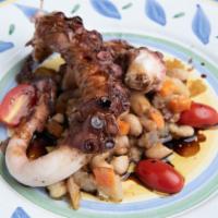 Polipo · Grilled octopus with cannellini beans.