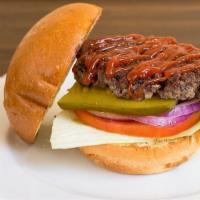 Classic Burger · 6 ounce beef patty, lettuce, tomato, onion, pickles, and ketchup.