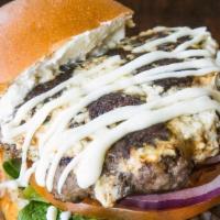 Mediterranean Burger · 1/2 lb. beef patty, mixed greens, tomato, onion, and feta-mix cheese.