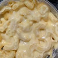 Mac & Cheese · Elbow macaroni covered in a cheese sauce.
