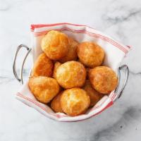 Cheese Puffs · Basket of warm cheese puffs