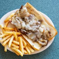 Phili Steak Wrap W/French Fries · grill sliced steak , grilled onions, Swiss cheese and bbq sauce.
