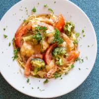 Seafood Fra Diavolo Over Linguini · served w/ soup or salad