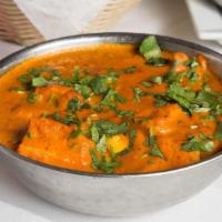 Chicken Tikka Masala · Chicken cubes cooked in cream based onion and tomato sauce.