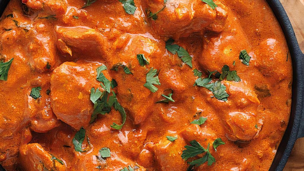 Butter Chicken · Chicken cooked with spices, herbs and butter sauce with bel pepper.