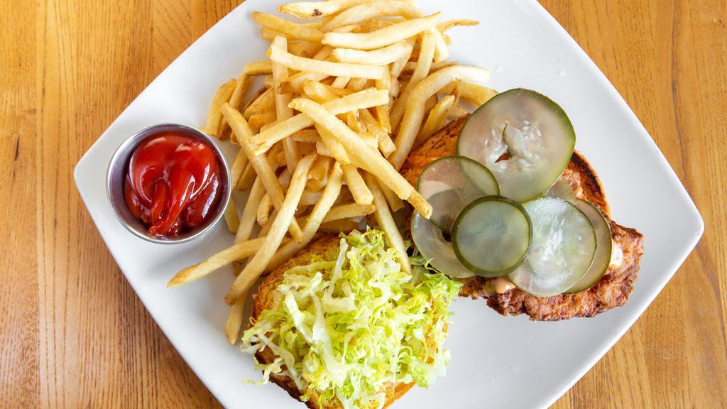 Fried Chicken Sandwich · Fried Chicken breast, lettuce, Pickle and House Sauce.