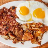 Corned Beef Hash & 2 Eggs · Served with potatoes and toast.