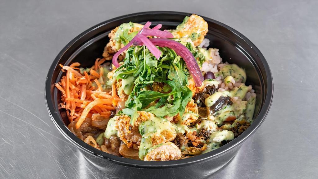 Soul Bowl · Choose from one of our signature bases, protein of your choice, any of our many fixins', and make it saucy with one of our signature sauces.