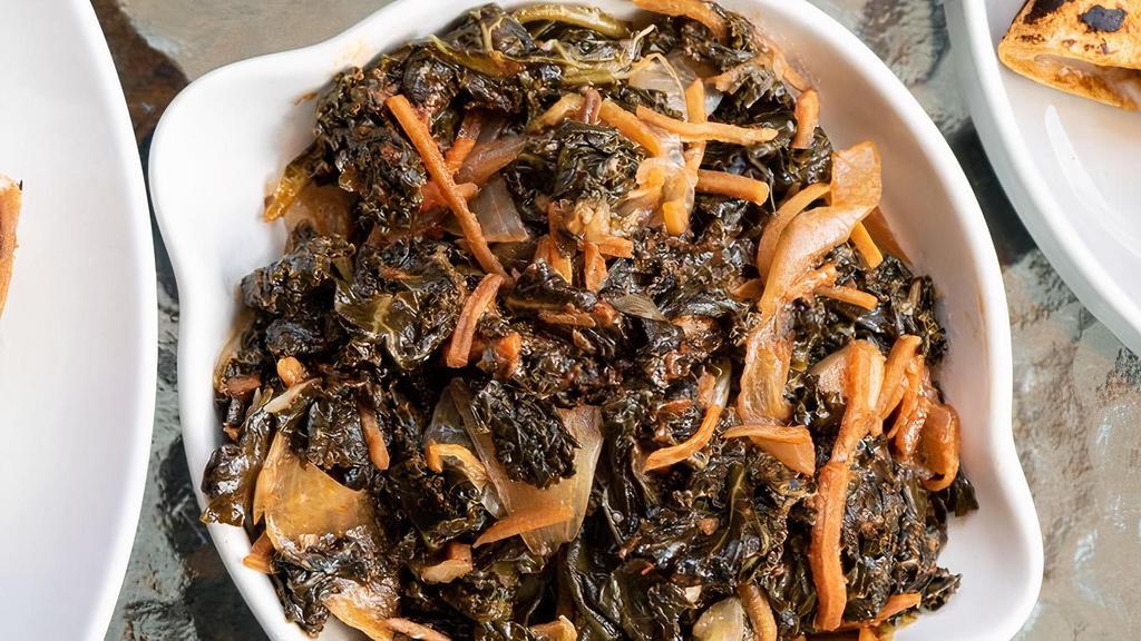 Saucy Greens · Our signature seasonal braised greens