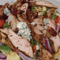 Chicken Cobb Salad · Mixed field greens, romaine, diced tomato, red onion, hard-boiled egg, diced avocado, crumbl...