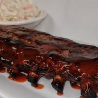 Fall Off The Bone Bbq Ribs · Recommended. Baby back ribs. Braised, grilled, and tangy award-winning BBQ sauce.