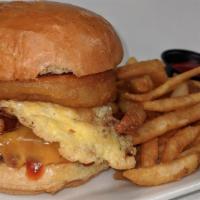 Ultimate · Applewood smoked bacon, organic fried egg Vermont cheddar, BBQ sauce, and onion rings. Brioc...