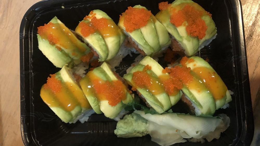 Godzilla Roll · Eight pieces. Spicy tuna & crunch inside, tobiko and avocado  sweet chili sauce on top.
