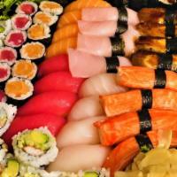 Sushi Party C · For four people. Tuna roll, salmon roll, eel roll, California roll & sushi - four yellowtail...