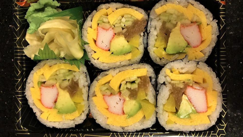 Maki Combo B · Salmon avocado, tuna cucumber and eel avocado rolls.