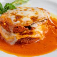 Eggplant Parmigiana · Eggplant coated with Breadcrumbs topped with Tomato Sauce and Fresh Mozzarella.