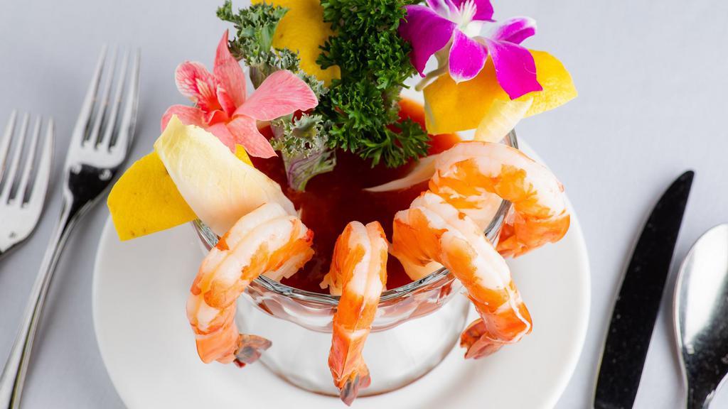 Shrimp Cocktail · 4 pieces.
Chilled Shrimp served with Cocktail Sauce.