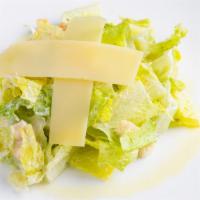 Caesar Salad · Hearts of Romaine Lettuce with Homemade Croutons and Parmesan Cheese.